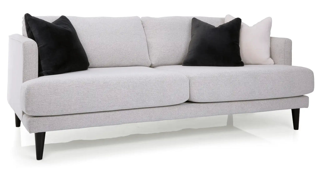 Ambrose sofa from Mobilart representing a made to order silhouette compared against ready-made stock options.