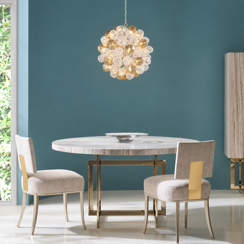 Caracole marble table with elegant metal and fabric dining chairs