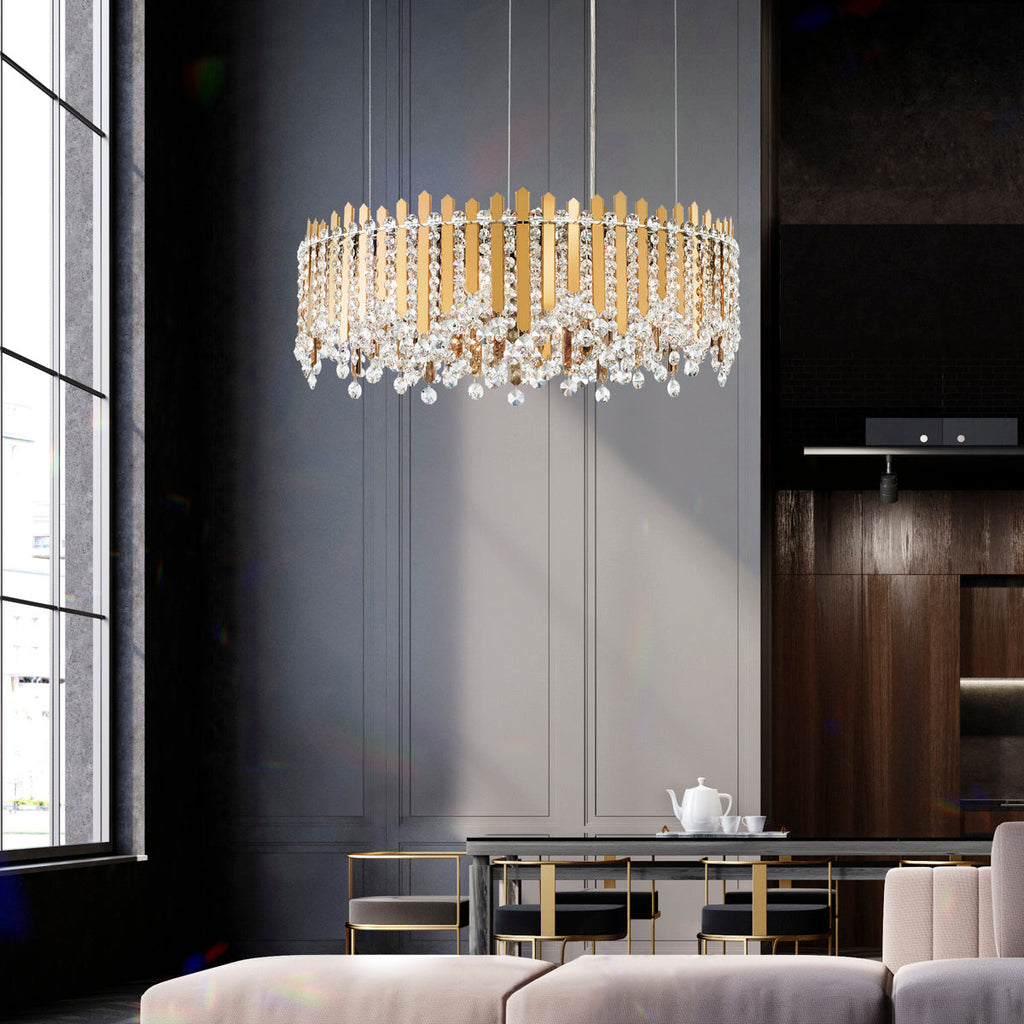 Round gold and crystal chandelier with cascading crystal drops above a dark modern dining room with marble table and brass chairs