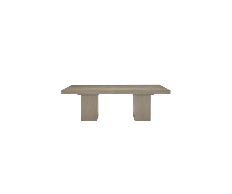 Eugenia dining table illustrating seating capacity considerations in the rectangular versus round comparison. 