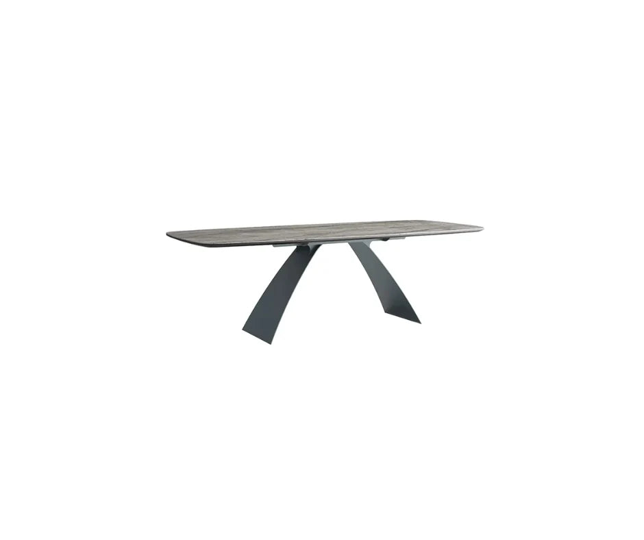 Alfredo dining table in antique finish, shown for material behaviour reference across table shapes.