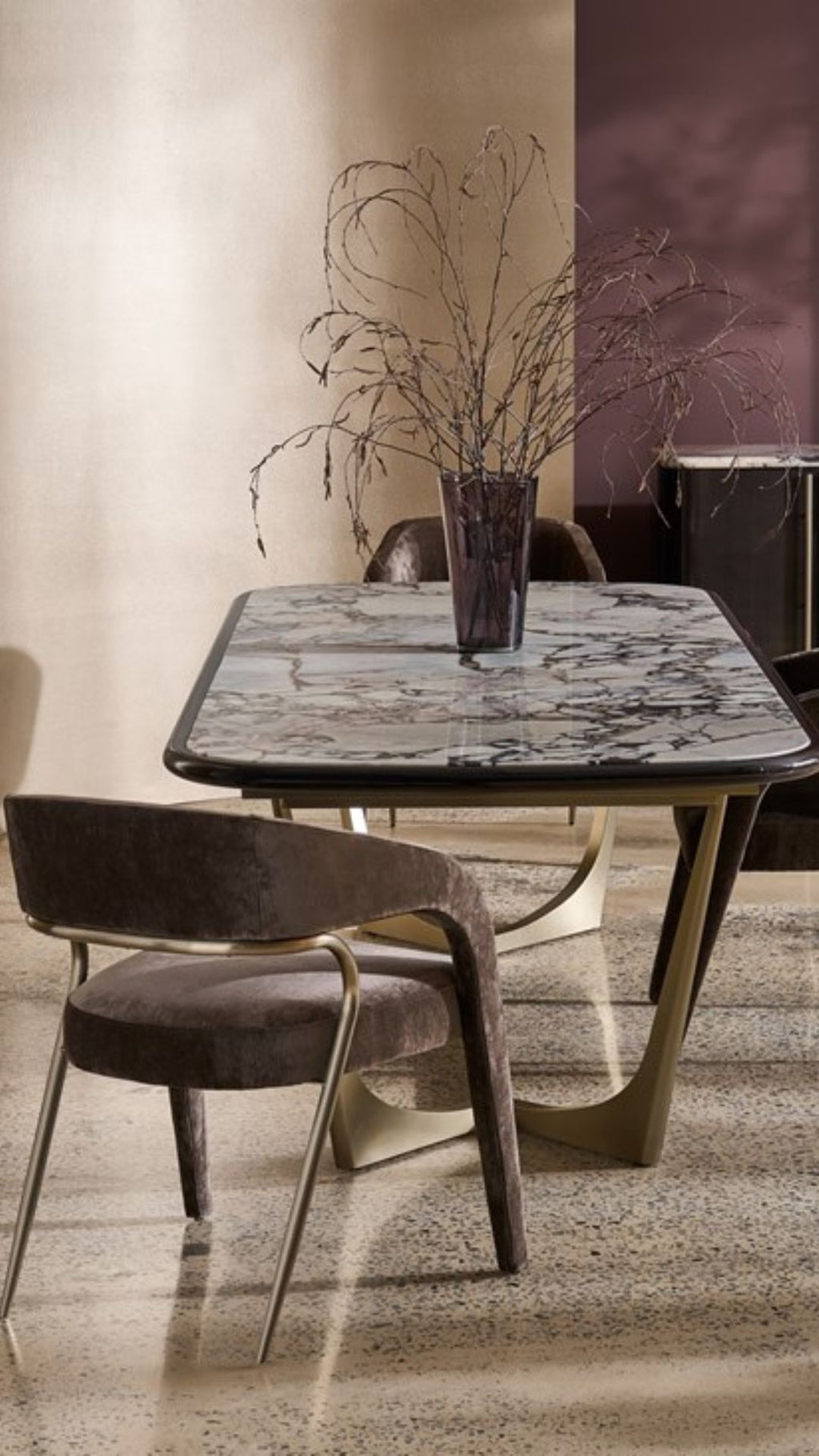 Dining room with marble table and chairs in a stylish interior setting