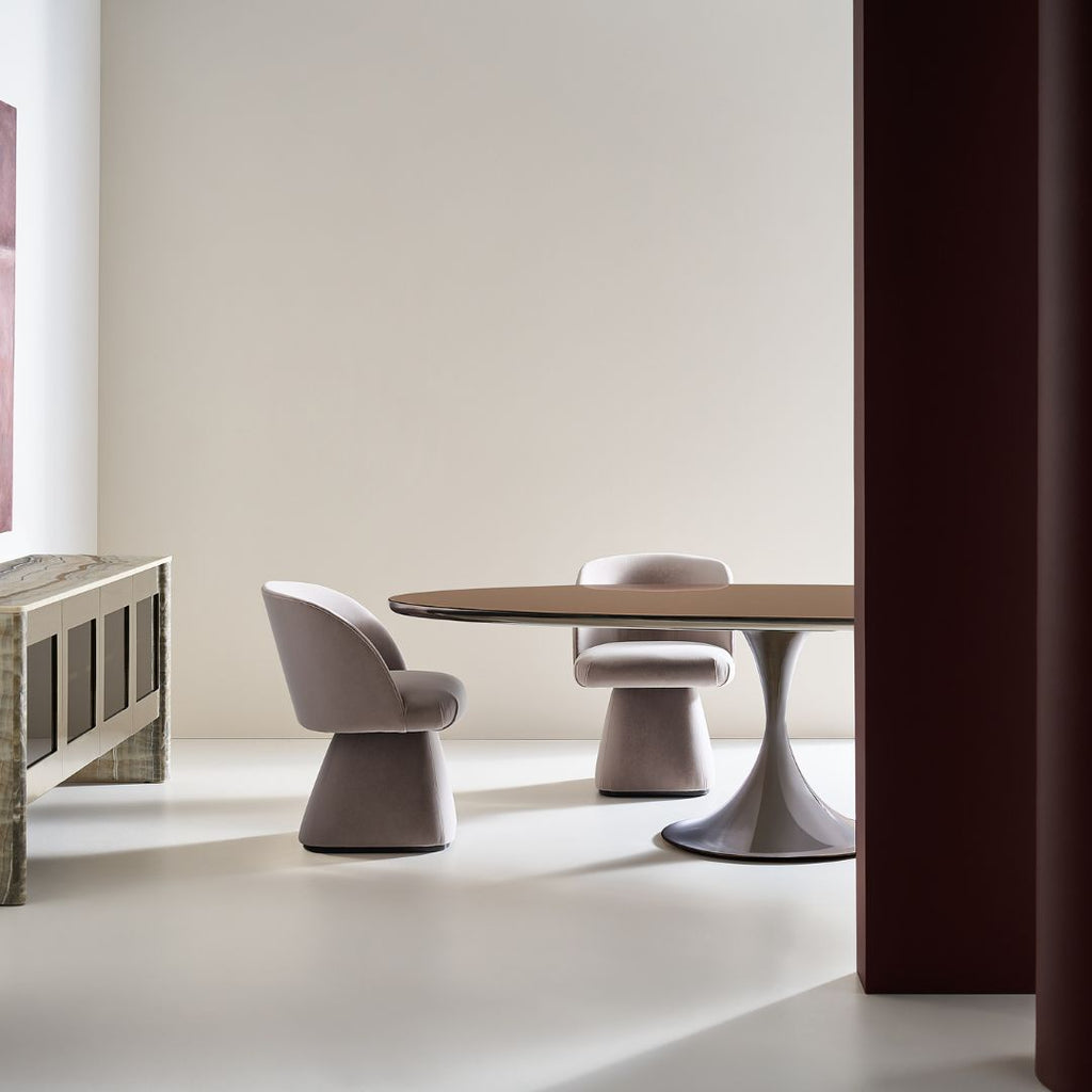 Modern dining table with chairs in a minimalistic room