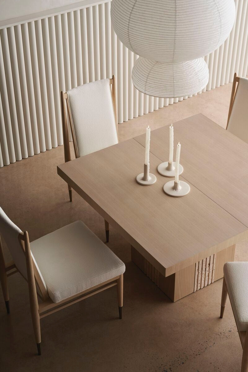 Japandi style dining room with ash wood and granite table .