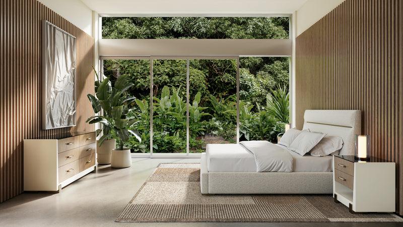 Modern bedroom with large windows, white textured linen bed, and textured wool carpet on cement floors.