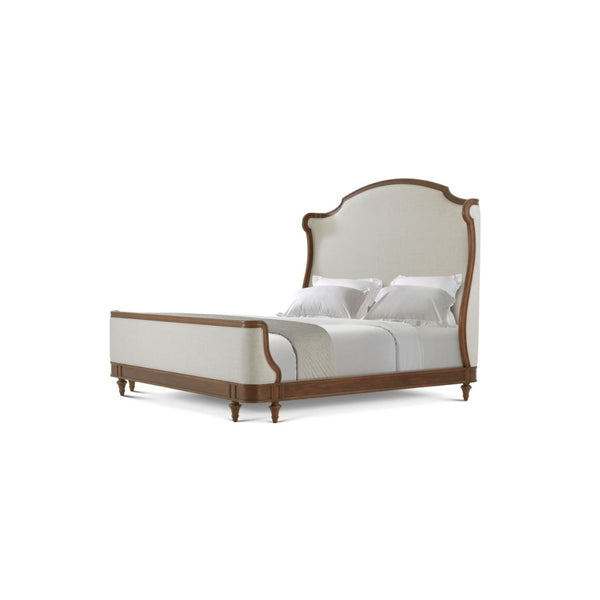A classic wooden bed frame with upholstered cream headboard and footboard, styled with white bedding and pillows on a solid white background.