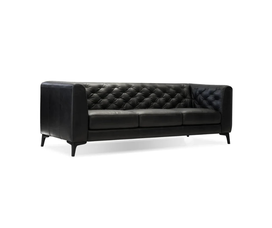 Clara black leather custom sofa demonstrating full grain leather grade and tapered wood leg finish at Mobilart. 