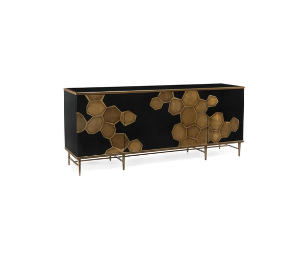 Black lacquer credenza with brass honeycomb inlay doors, slim metal legs, and a clean rectangular profile, shown isolated on a white background.